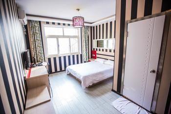 Qingdao Aisen Apartment Hotel Экстерьер фото