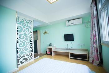 Qingdao Aisen Apartment Hotel Экстерьер фото