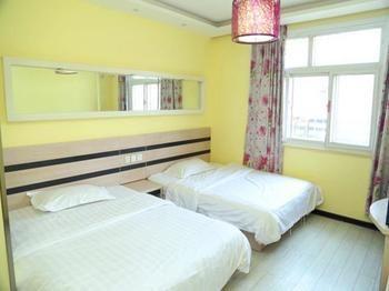 Qingdao Aisen Apartment Hotel Экстерьер фото