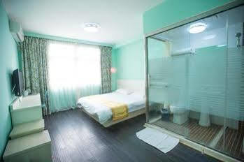 Qingdao Aisen Apartment Hotel Экстерьер фото
